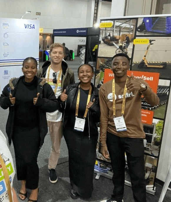 The Fleetser team with operators at a micromobility trade show